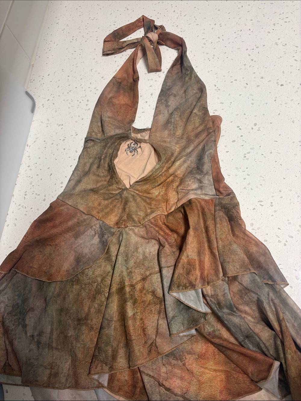 Sleeveless Plunge-Neck Tiered Mini Dress in Earth Tones - Picture 1 of 4